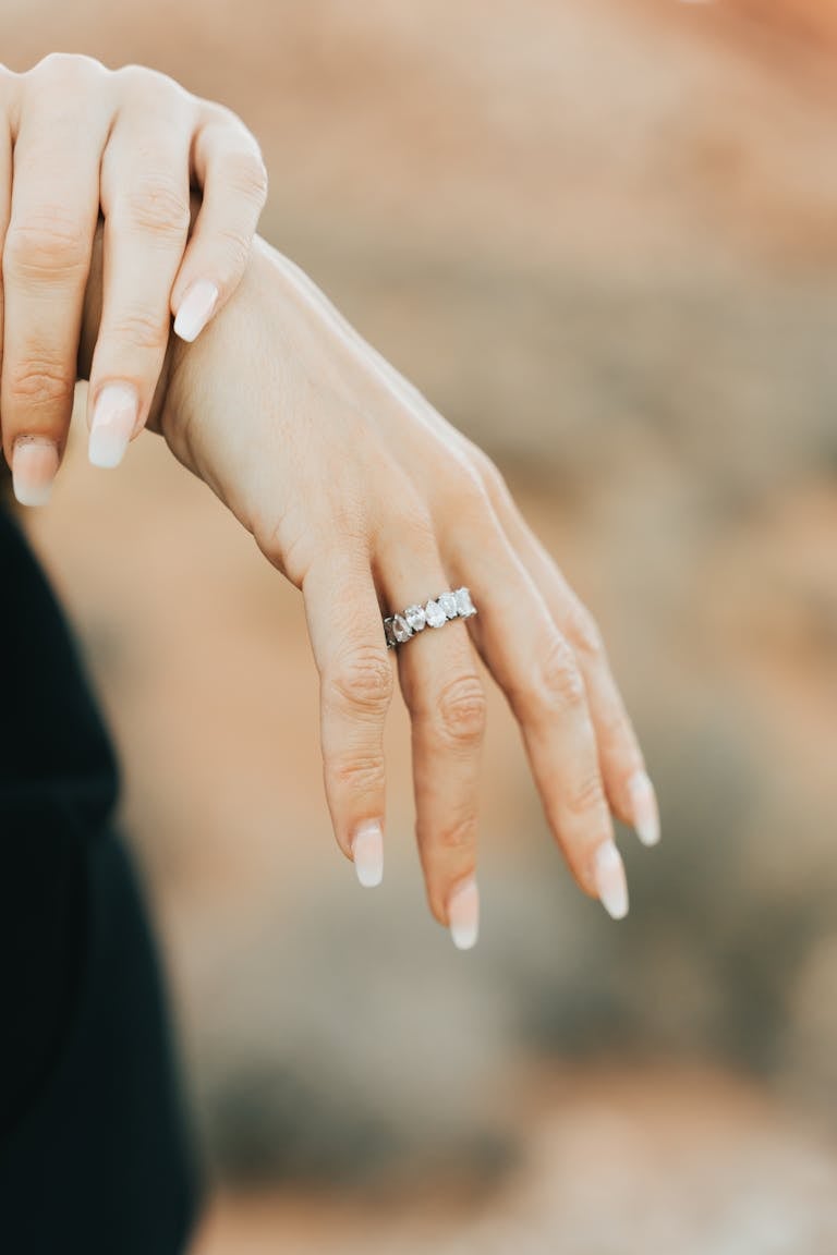 Close-up of a hand wearing a diamond ring in Las Vegas. Elegant and stylish jewelry display.